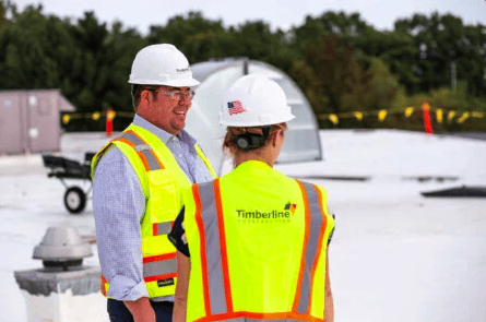 Timberline construction workers surveying jobsite